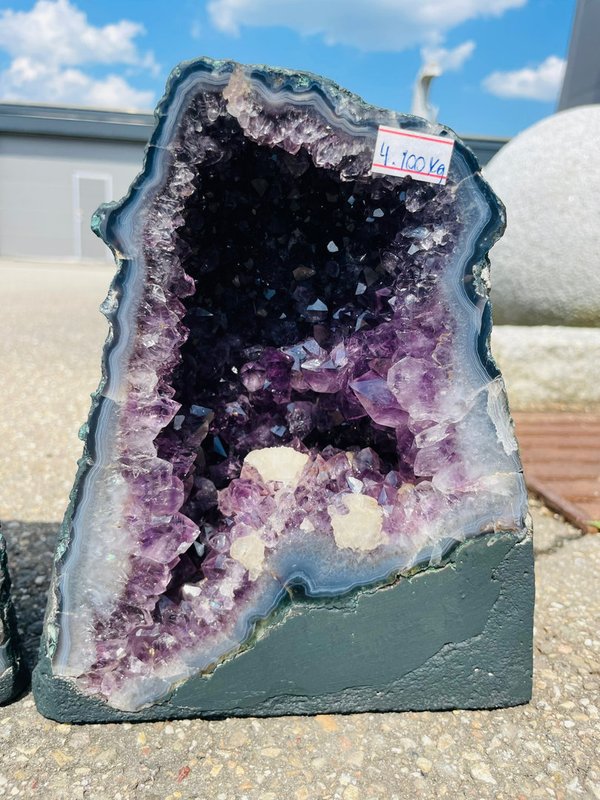 Great amethyst druse pair with many calcite flowers and blue calcedon