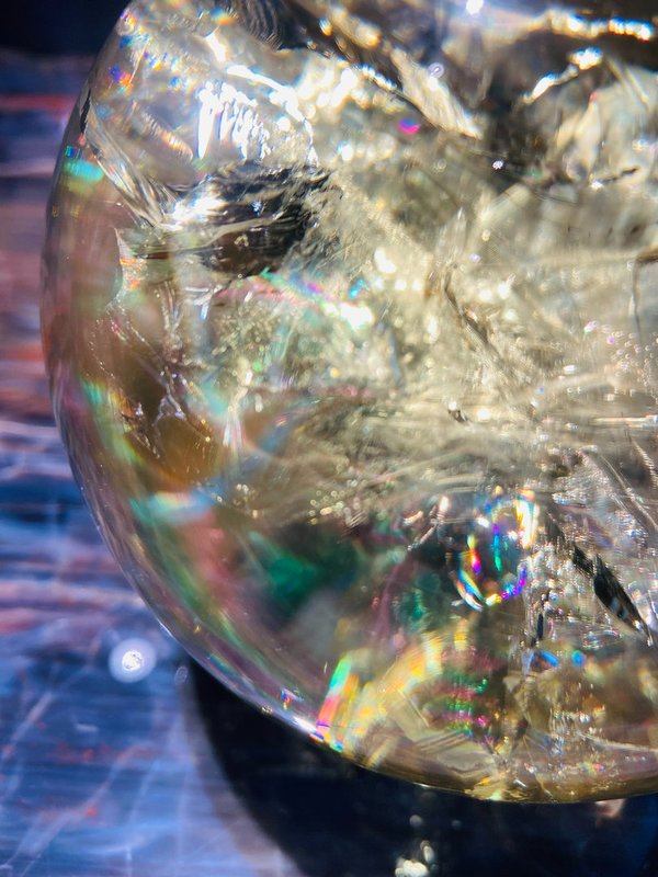 Beautiful citrine ball with rainbow colored inclusions