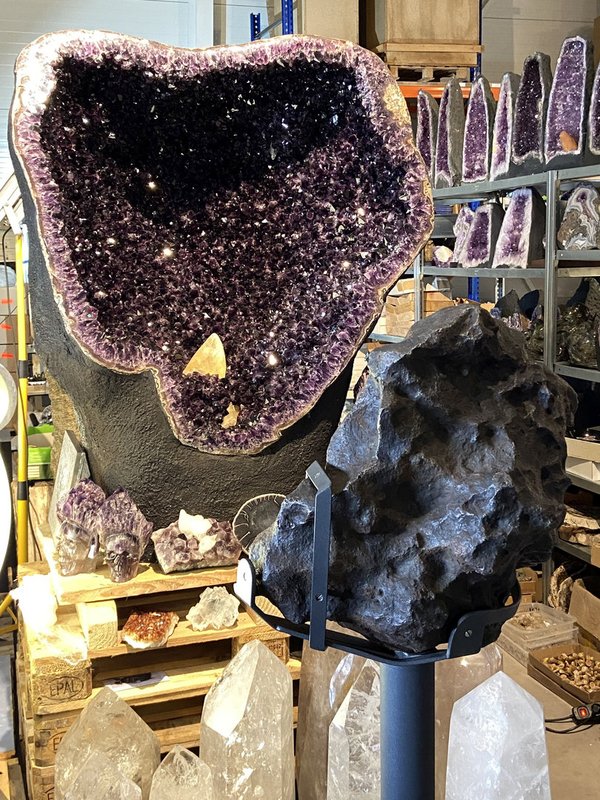huge dark amethyst druse with big yellow calcite crystal