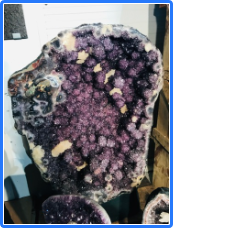 Amethyst druse with white calcite crystals and stalactites