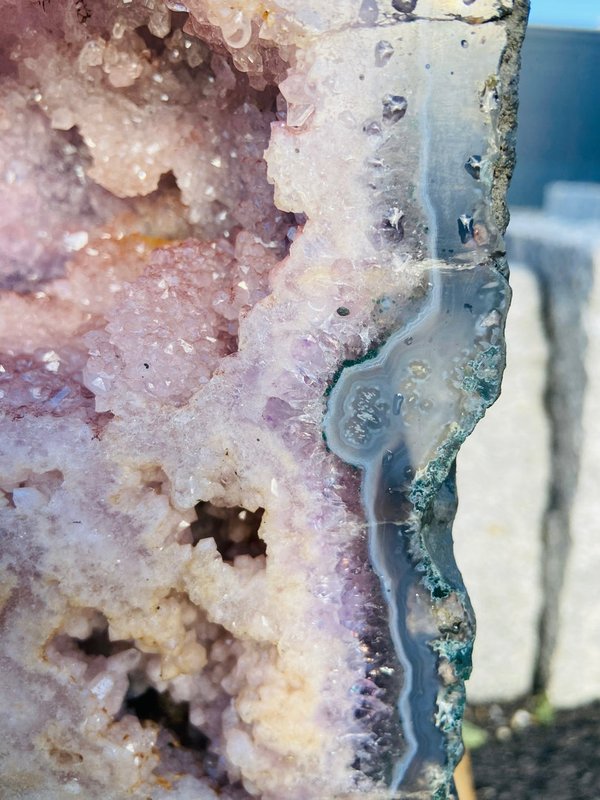 Pair of two-chamber amethyst druses with pink quartz crystals