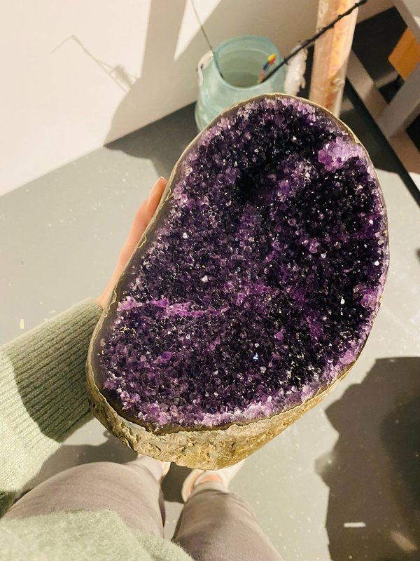 Oval amethyst druse in bright color from Uruguay
